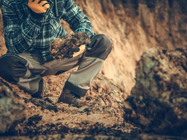 Geologist checking soil