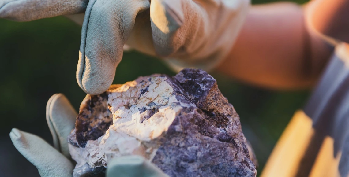 Geologist examining a rock
