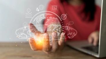 Student holding a world of possibilities